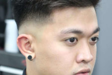 07 a drop fade haircut features a longer top and shorter sides that contrast
