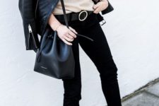 09 a casual look with black skinnies, a tan top, a black leather jacket, white sneakers and a black bucket bag