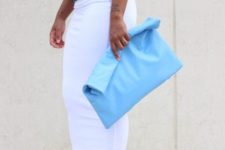 10 a light blue oversized soft clutch is a bright color statement in your spring look