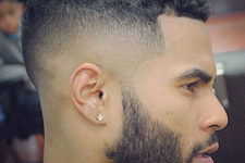 10 a skin fade, curls and a full beard is a stylish idea to rock right now