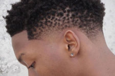 15 twisted curls with a blow out fade look stylish and relaxed at the same time