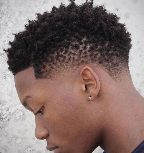 twisted curls with a blow out fade look stylish and relaxed at the same time