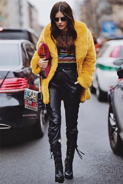 With colorful shirt, yellow fur coat, printed bag and lace up boots