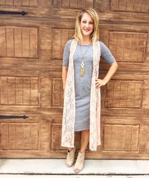 With gray midi dress and cutout boots