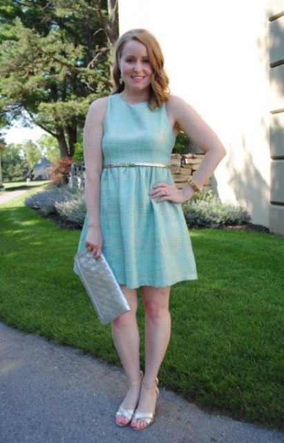 With light blue dress, clutch and metallic shoes