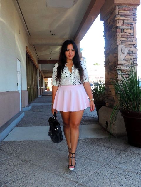 With pale pink skater skirt, black bag and lace up shoes