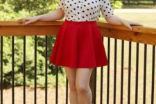 With red skater skirt and black flat shoes
