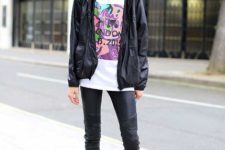 With t-shirt, black jacket and black leather pants
