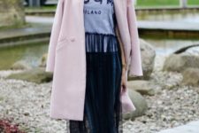 With t-shirt, pale pink coat and black ankle boots