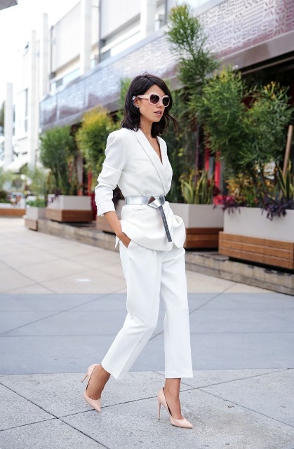 With white blazer, white cropped trousers and pale pink pumps