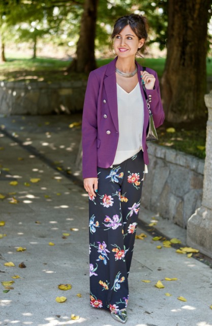 With white loose shirt, purple blazer, silver shoes and small bag
