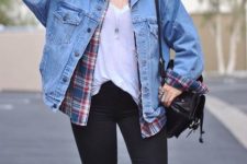 With white loose t-shirt, plaid shirt, distressed pants and black backpack