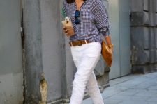 With white pants, brown belt, brown clutch and ankle strap shoes