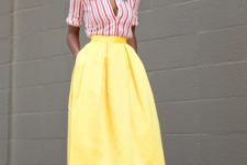 With yellow midi skirt and red shoes