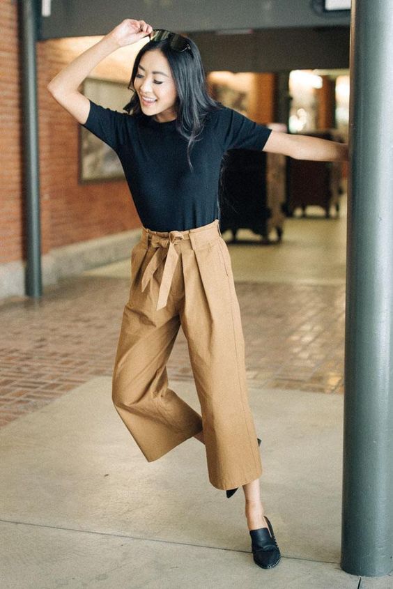 a black tee, camel high waisted culottes and black loafers can be a nice work outfit