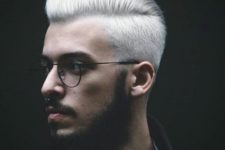 06 perfect silver blonde with a taper cut and short sides, a black beard and glasses