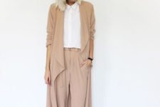 09 a camel suit with cropped pants and a duster, a white button down and white sneakers