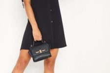 With black leather small bag and black ankle boots