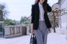 With blouse, black blazer, black mini bag and shoes