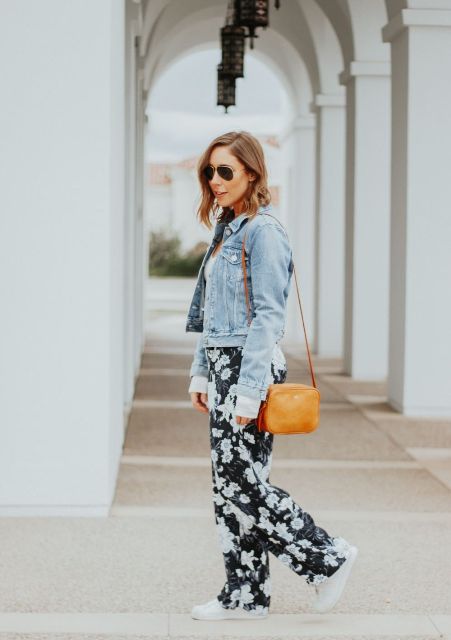 With denim jacket, orange bag and white sneakers