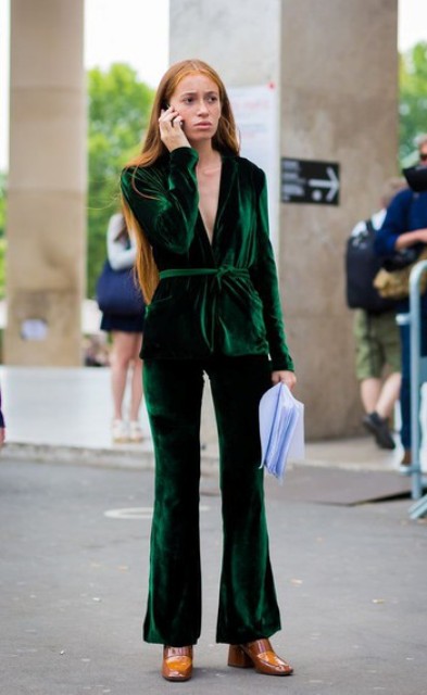 With emerald velvet blazer and orange and brown shoes