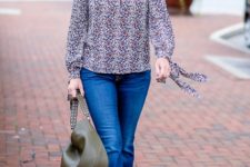 With flare jeans, olive green bag and brown shoes
