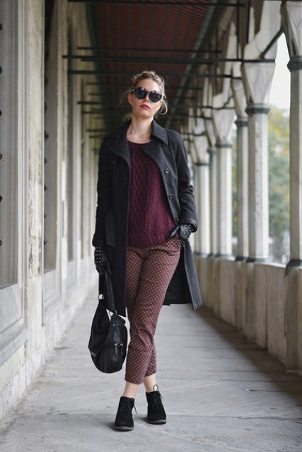 With marsala sweater, black bag, lace up boots and black coat