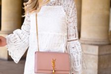 With pale pink chain strap bag