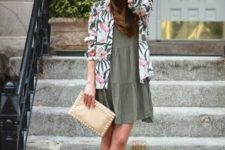 With printed blazer, wide brim hat, beige clutch and olive green shoes