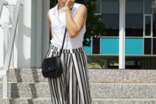With sleeveless top, black crossbody bag and black shoes