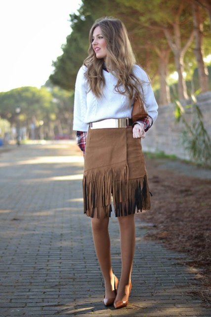 With sweater, belt, brown clutch and shoes