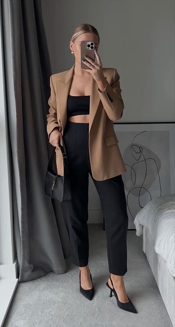 a refined work look with a black crop top and cropped pants, black slingbacks and a baguette bag plus a beige blazer on top
