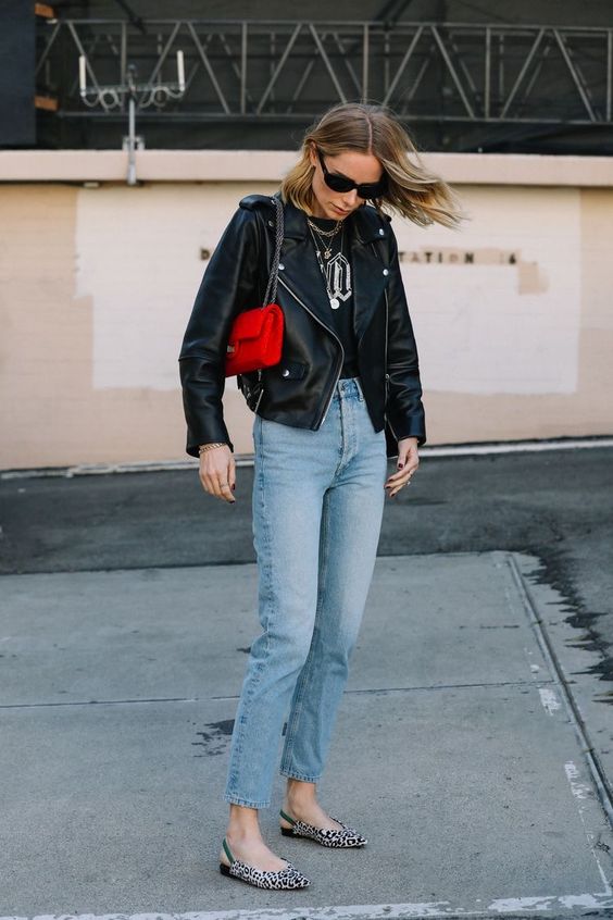 a spring look with a black printed tee, bleached jeans, leopard print slingbacks and a red bag
