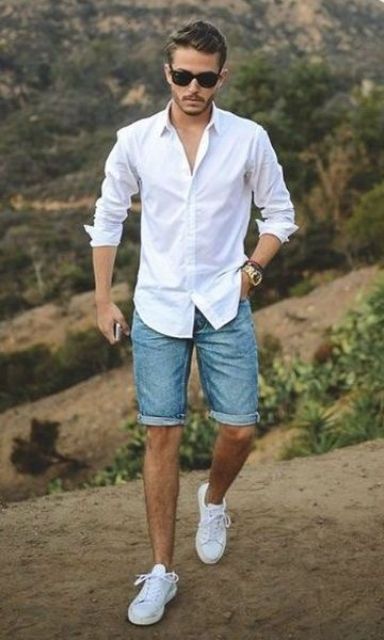 blue denim shorts, a white button down, white sneakers and sunglasses for a casual chic look