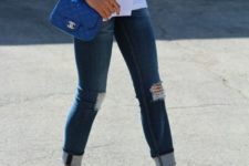 05 a graphic white tee, ripped blue denim, neon yellow heels and a bright blue crossbody