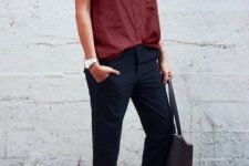 06 black pants, a burgundy straight button down with short sleeves, neutral studded shoes and a blakc tote