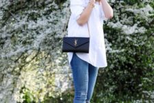 07 an oversized white button down, blue ripped skinnies, bright blue heels and a black clutch