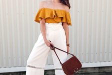 08 a mustard off the shoulder ruffle top, white culottes with a sheer insert, white loafers and a brown bag
