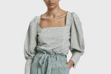 With checked belted trousers