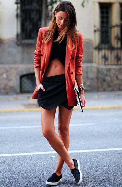 With crop top, mini skirt and slip on shoes