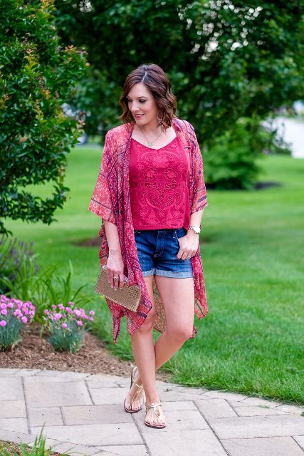 With pink shirt, shorts, metallic clutch and flat sandals