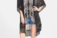 With printed loose top, denim shorts and cutout boots