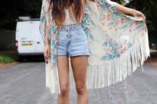 With sleeveless top, denim shorts and brown platform boots