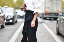 With white button down shirt, ankle strap shoes and clutch