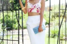 With white pencil skirt, blue clutch and white pumps