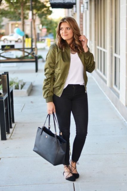 With white t-shirt, black skinny pants, tote bag and lace up flats