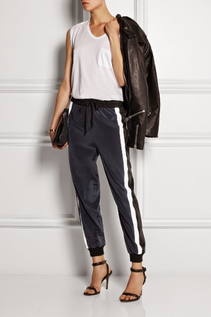 With white top, leather jacket, black bag and ankle strap shoes