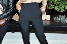a tan silk blouse with long sleeves, black high waisted pants, nude shoes for a chic party look
