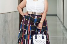 a white sleeveless button down, colorful printed culottes, a polka dot bag and white shoes for a catchy look