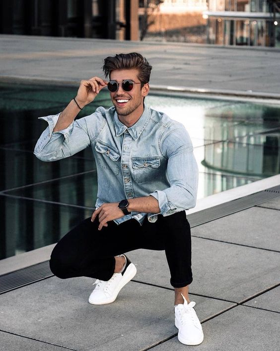 black skinnies, a light blue chambray shirt, white sneakers for a relaxed sprign to summer look